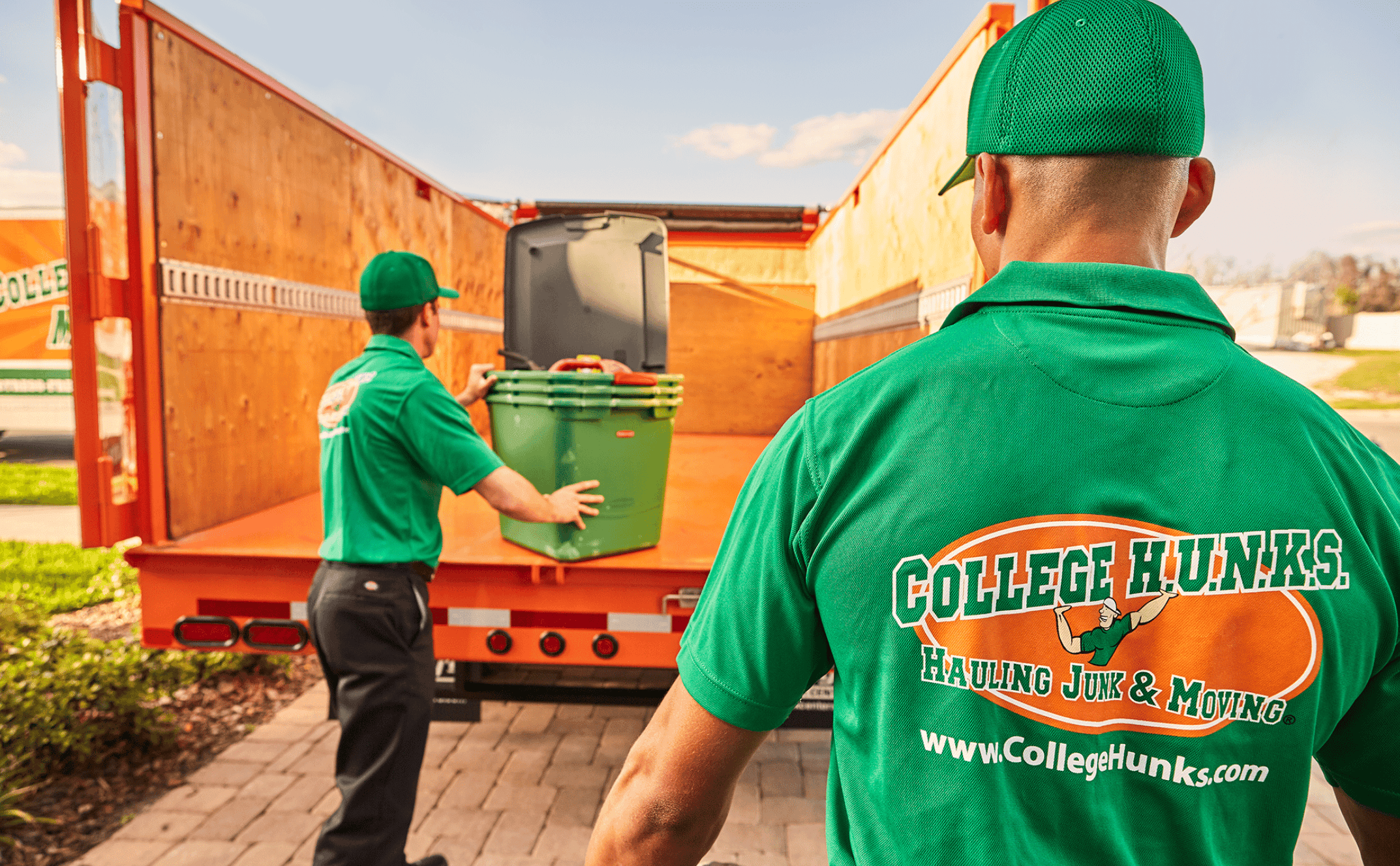A reliable junk removal franchise truck loaded with discarded items for disposal